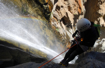 Judit rappeling chained waterfalls (110 ft)